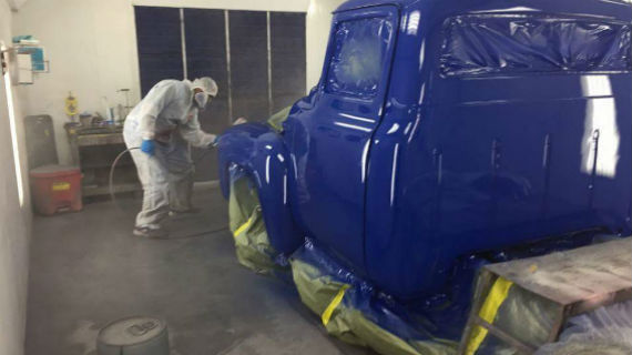 Many different cars in Auto Body shop pending repair